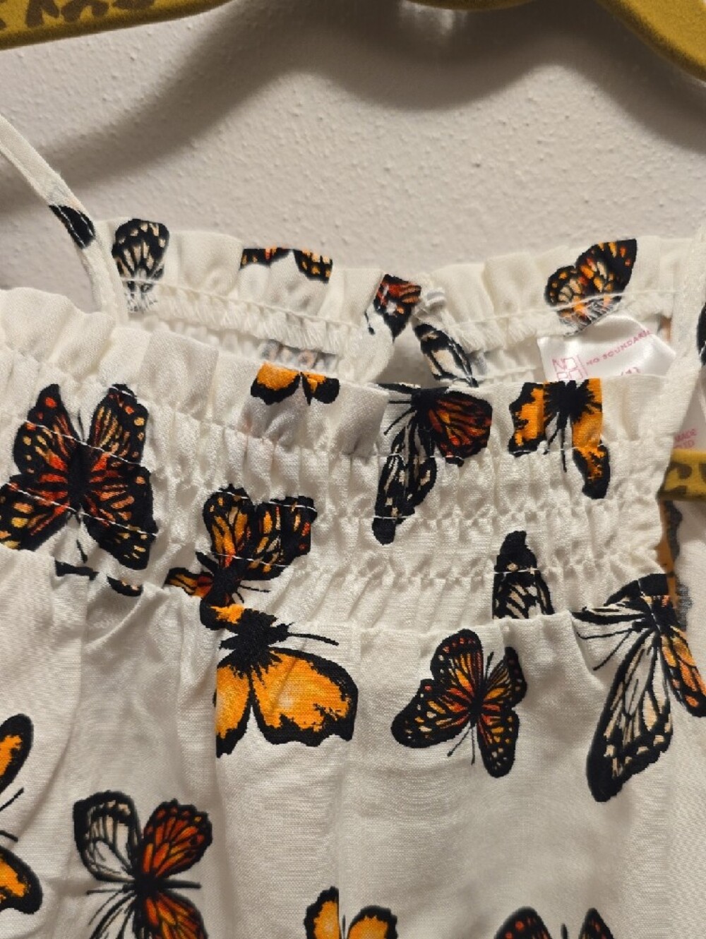 No Boundaries White Halter Top with Orange and Black Butterfly Print - Picture 3 of 10